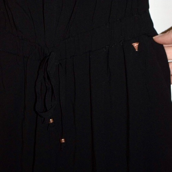 Black Guess Strapless Off-The-Shoulder Jumpsuit - Picture 7 of 10